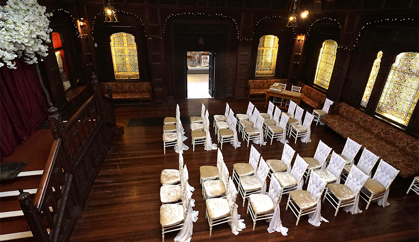 The historic Durbar Hall, a wedding venue in East Sussex set up for a wedding ceremony