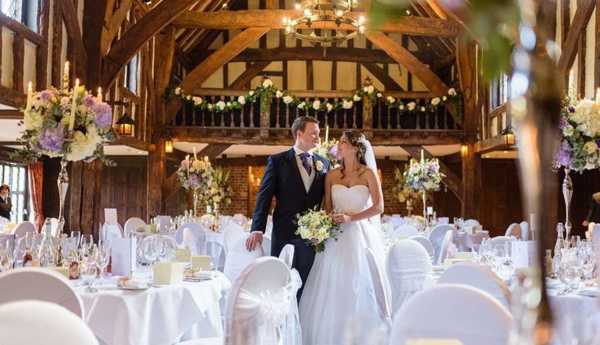 Bride and Groom in the Tithe Barn at Great Fosters