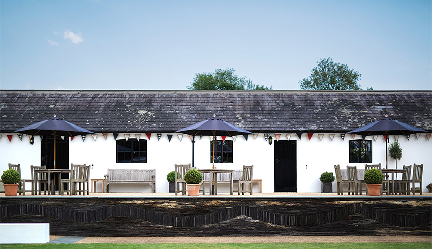The outside wedding reception space at Hendall Manor Barn, East Sussex