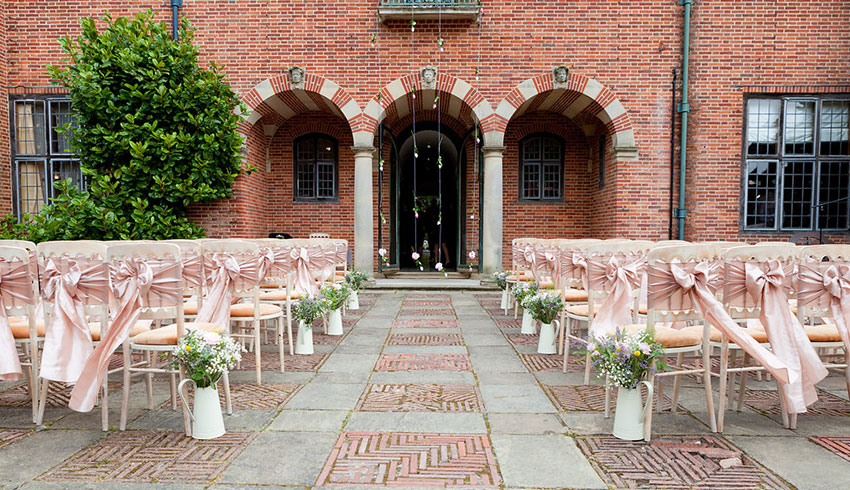 Outdoor wedding ceremony area at Port Lympne Hotel and Reserve, a Kent wedding venue.