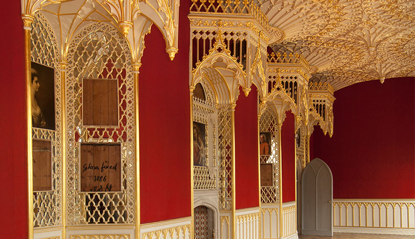 Red and gold wedding room inside Strawberry Hill House, London wedding venue
