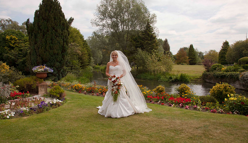Bride in the grounds of the Old Mill